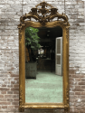 langwerpige antieke spiegel met kuif